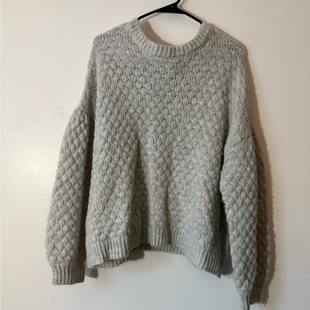 light grey sweater